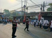 Polsek Bantar Gebang Amankan Pawai Kenaikan Kelas Yayasan Tarbiyatul Falah