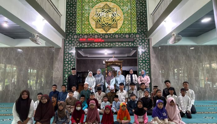Evi Mafriningsianti dan SAE Berbagi Kebahagiaan Bersama Puluhan Anak Yatim